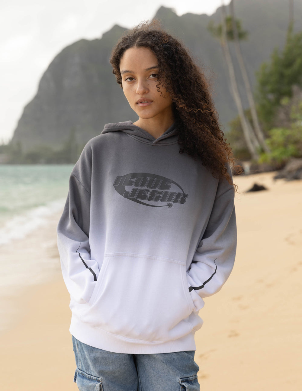Unisex gray pullover hoodie with 'I Love Jesus' logo on front