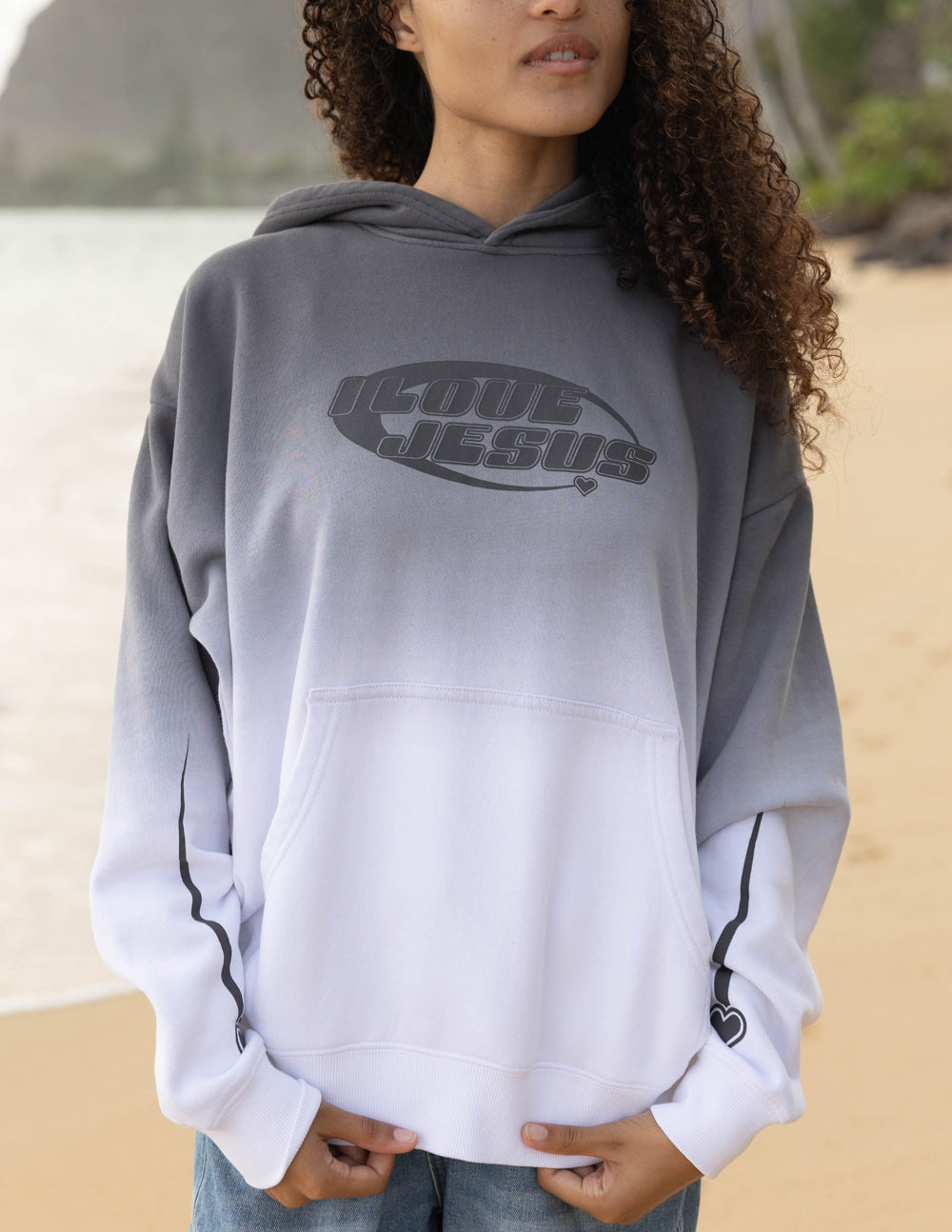 Unisex gray pullover hoodie with 'I Love Jesus' logo on front and hood