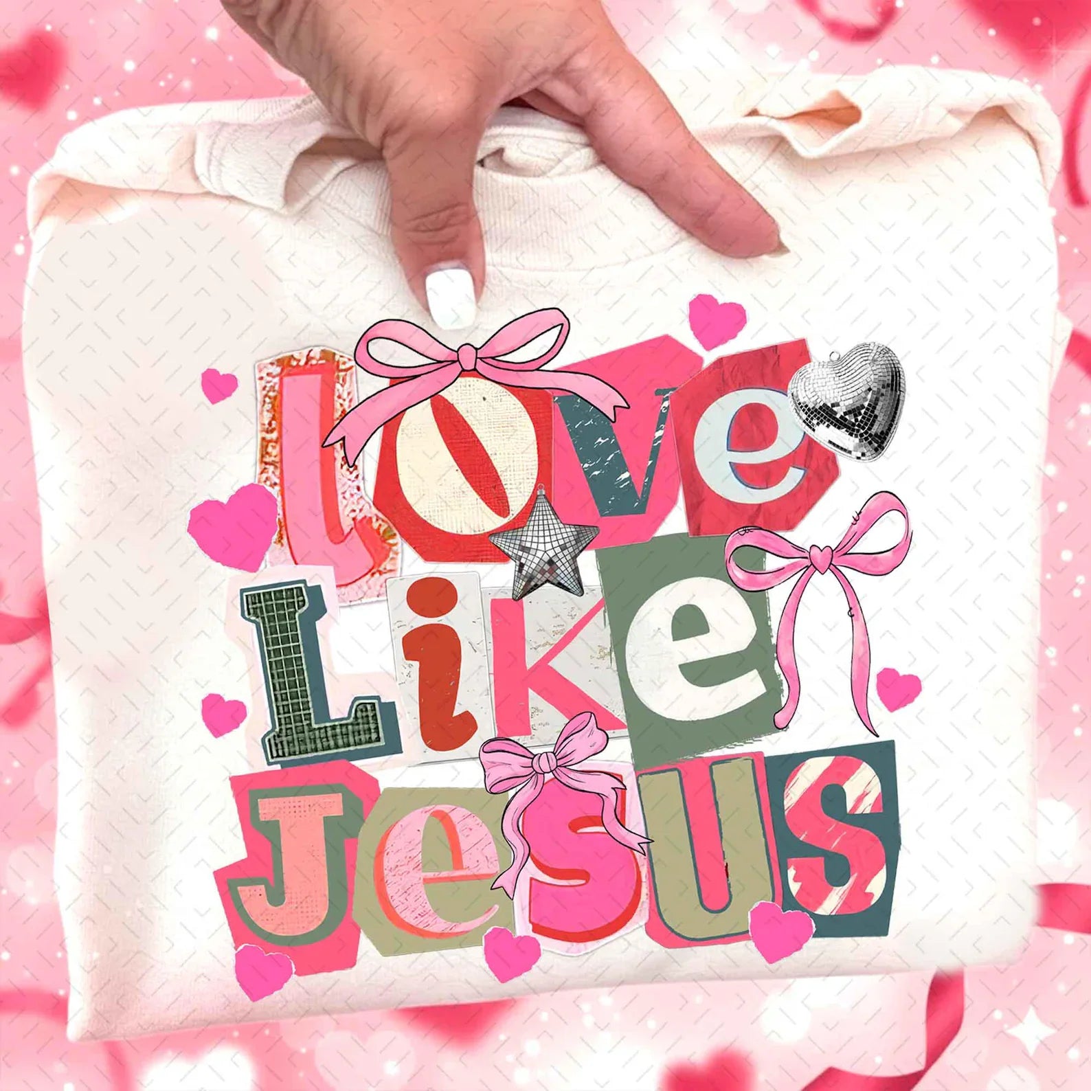 Cream short-sleeve graphic T-shirt with 'Love Like Jesus' hearts and bow accents