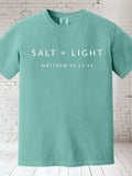Mint T-shirt with 'SALT + LIGHT' and 'MATTHEW 15:13-16' on front