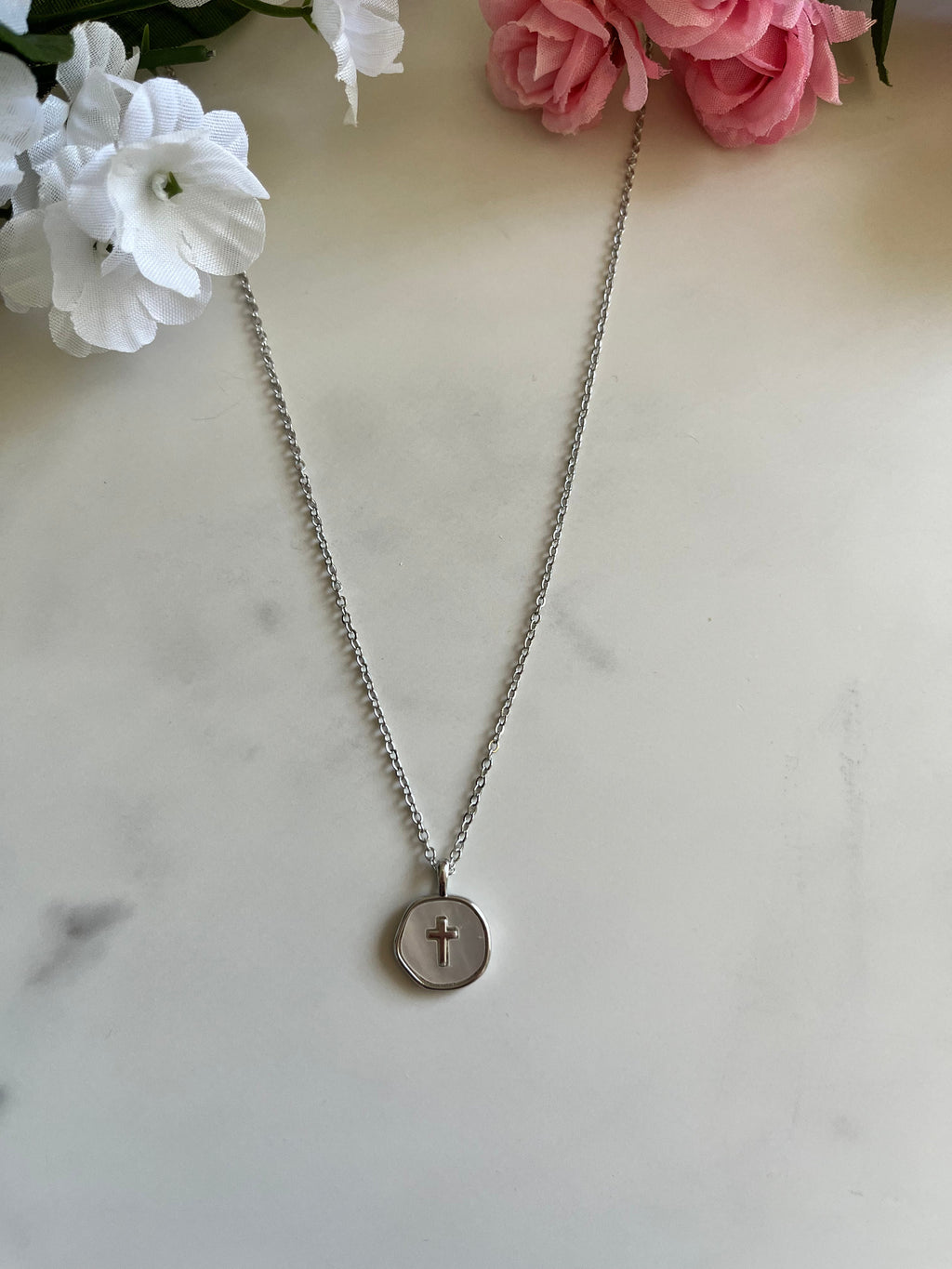 Silver cross pendant necklace with round disc charm and fine chain