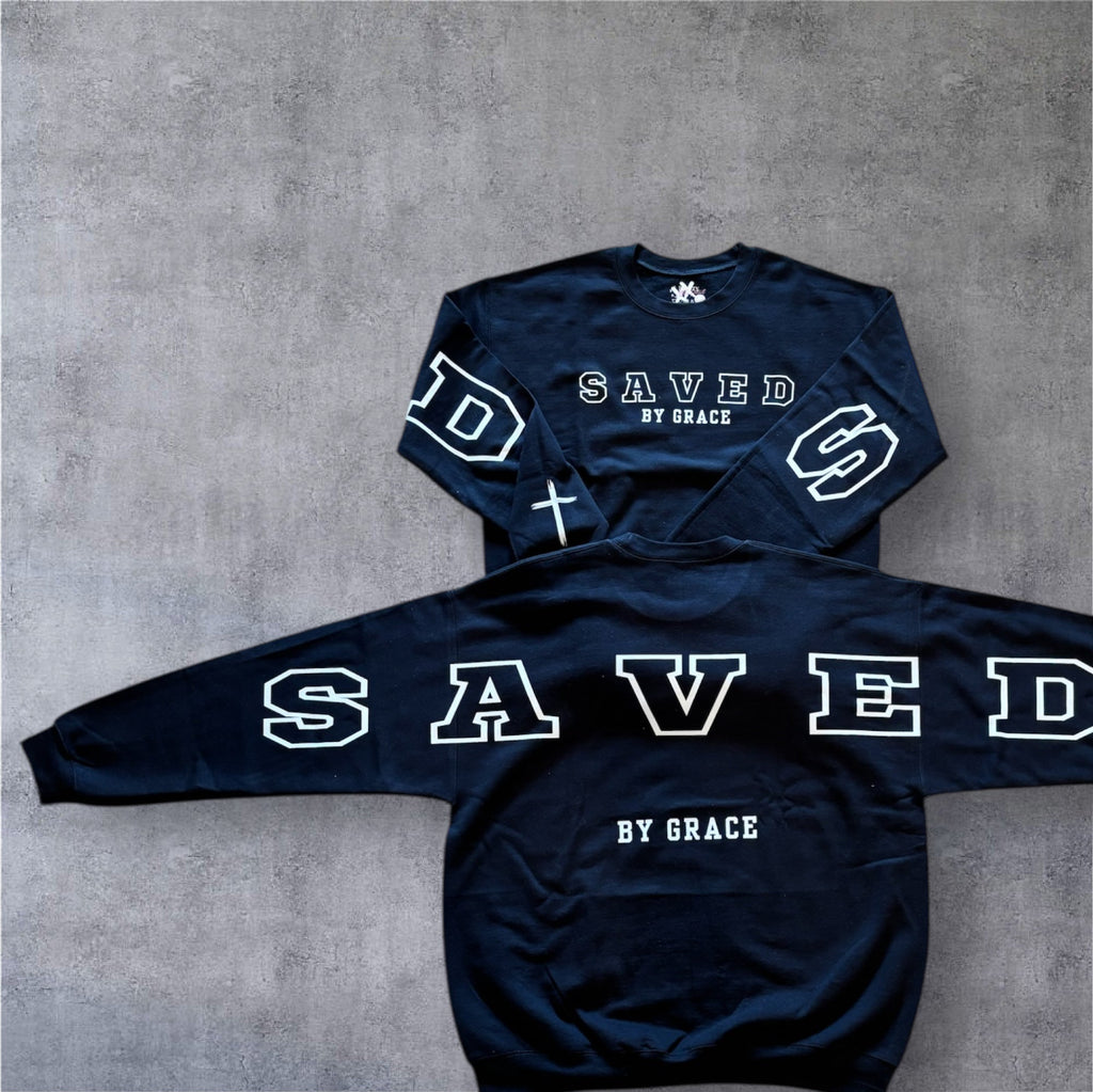 Navy crewneck sweatshirt with SAVED front graphic and crosses