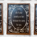 Framed inspirational wall art sign with white oval text on dark background