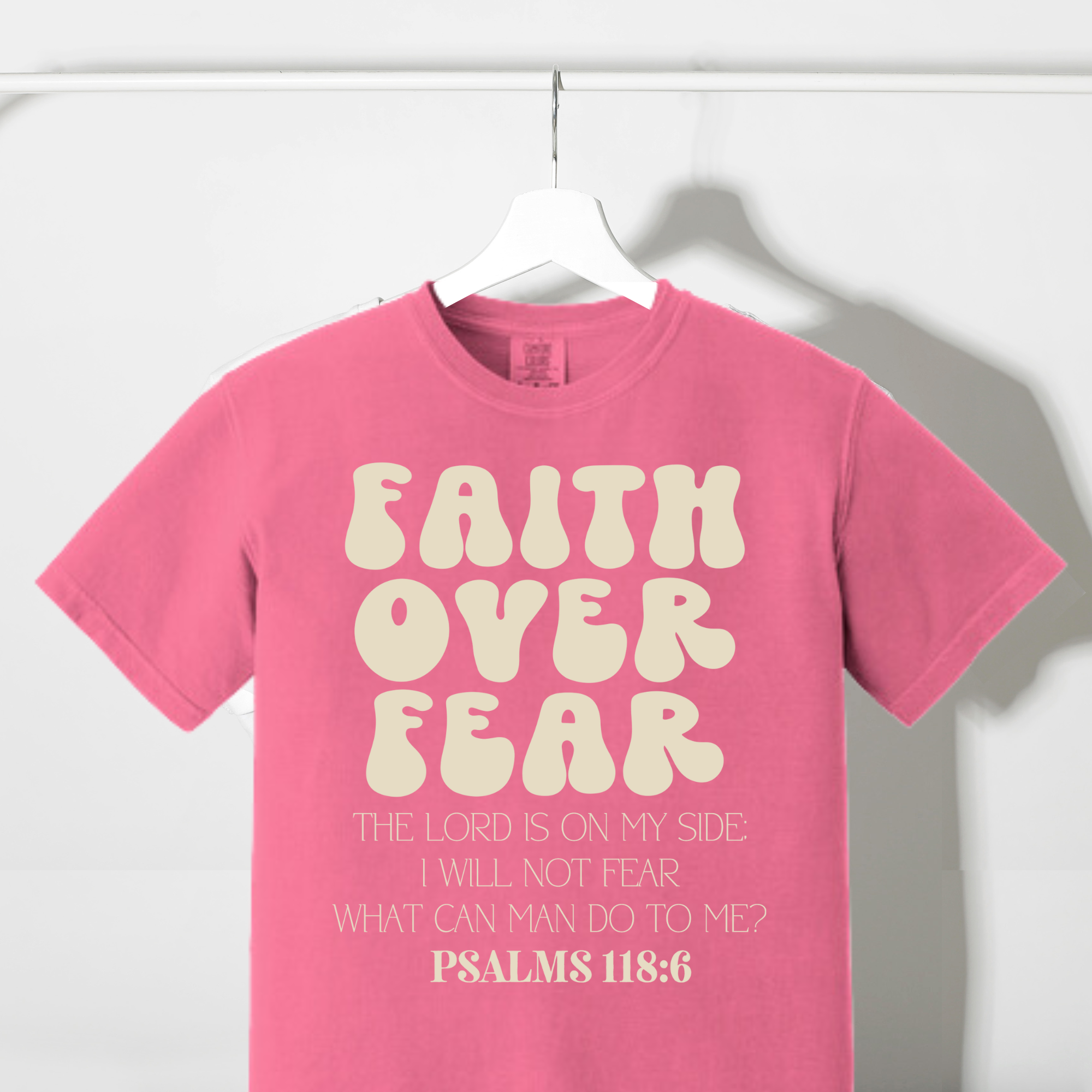 Pink crewneck T-shirt with Faith over Fear scripture print
