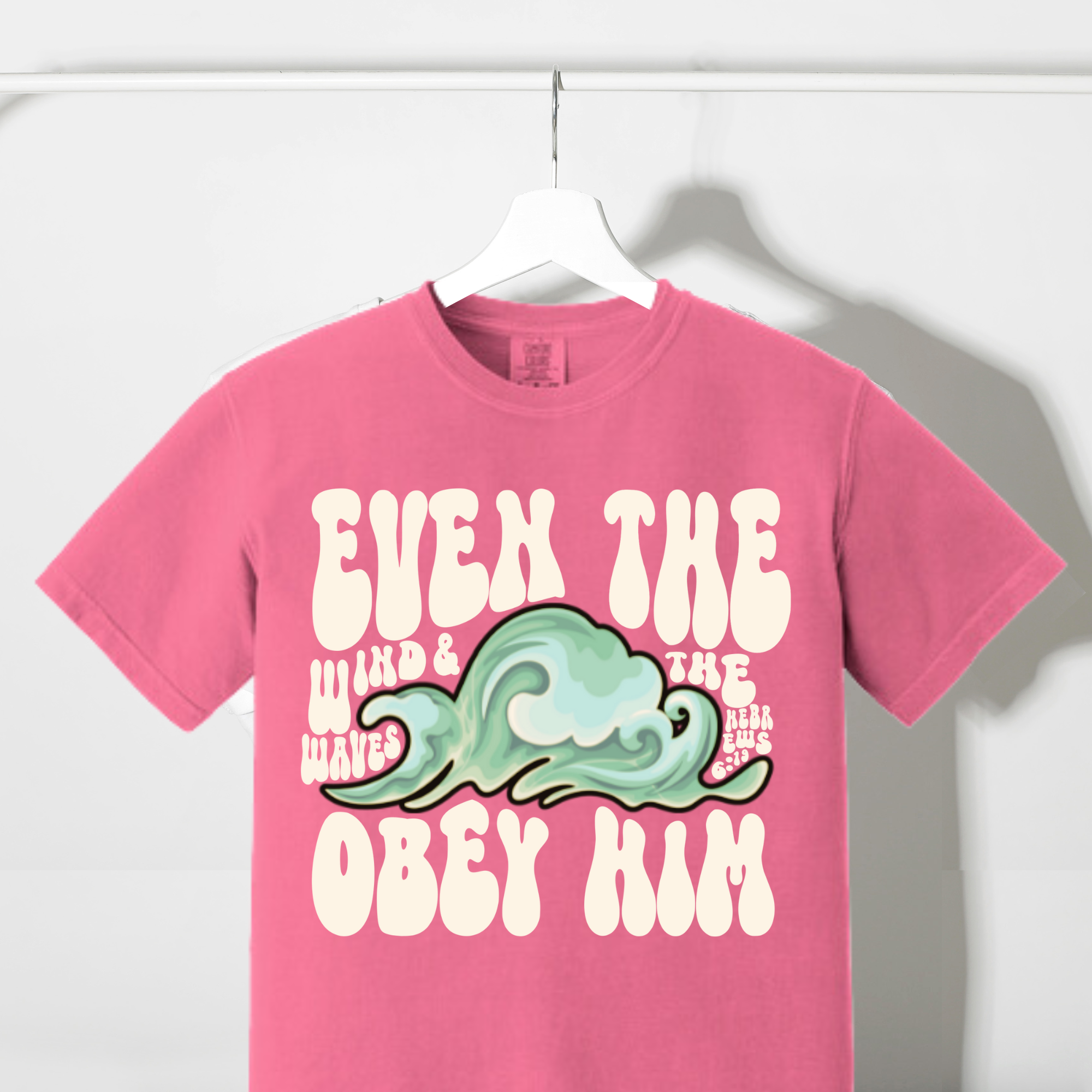 Pink crewneck T-shirt with large front lettering and wave graphic