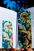 Handcrafted Christian bookmark with colorful stained-glass-style angel portrait