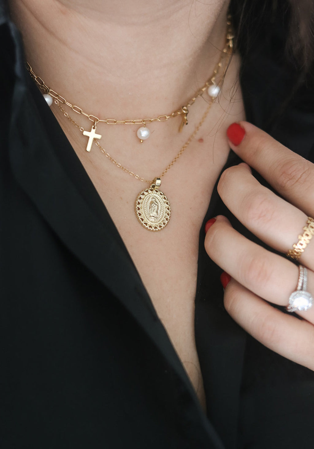 Gold cross and pearl necklace with round medallion charm and chain