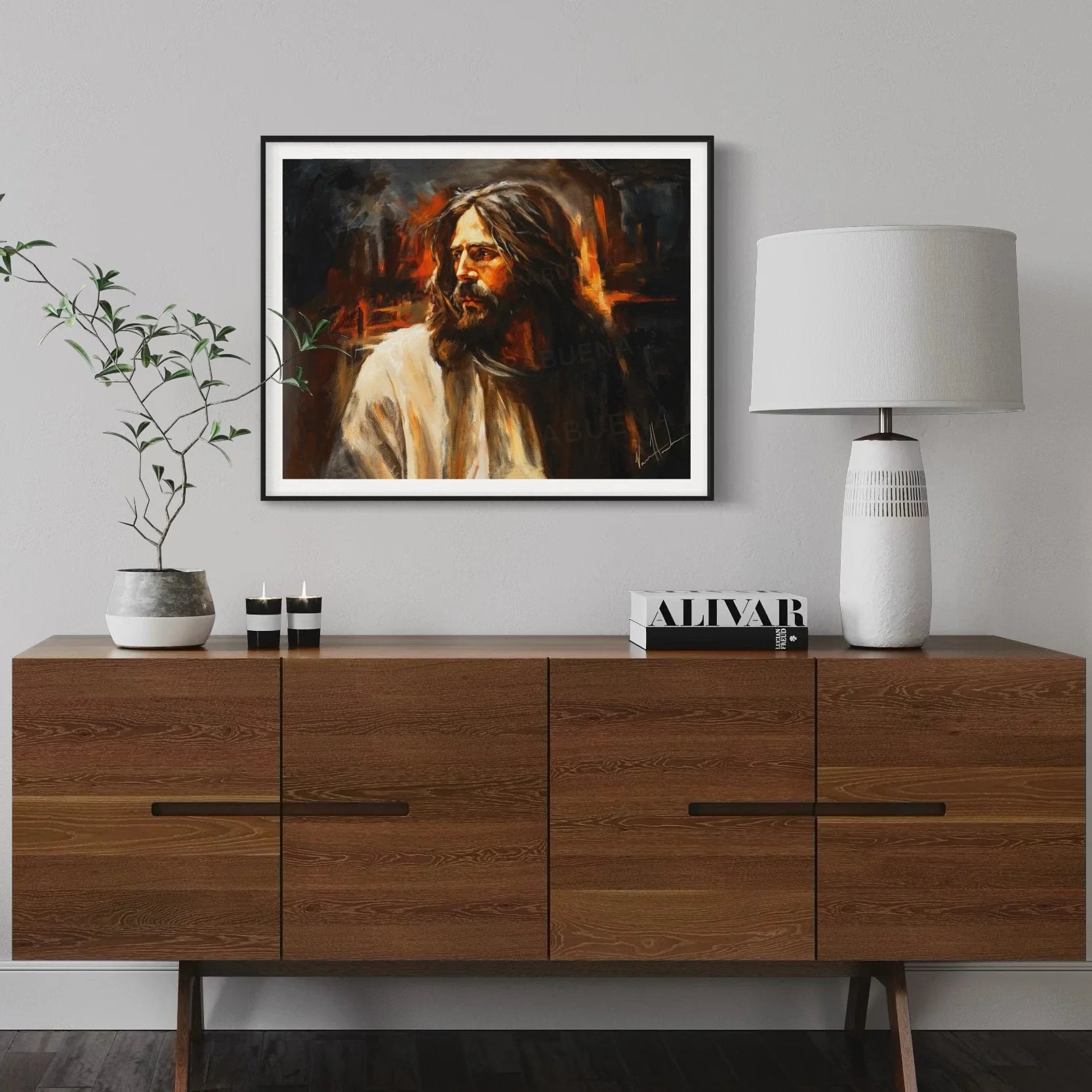 White-matted framed portrait of a bearded man with long hair, warm tones.