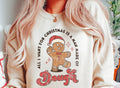 Cream graphic tee with gingerbread man text and red "Dough" design