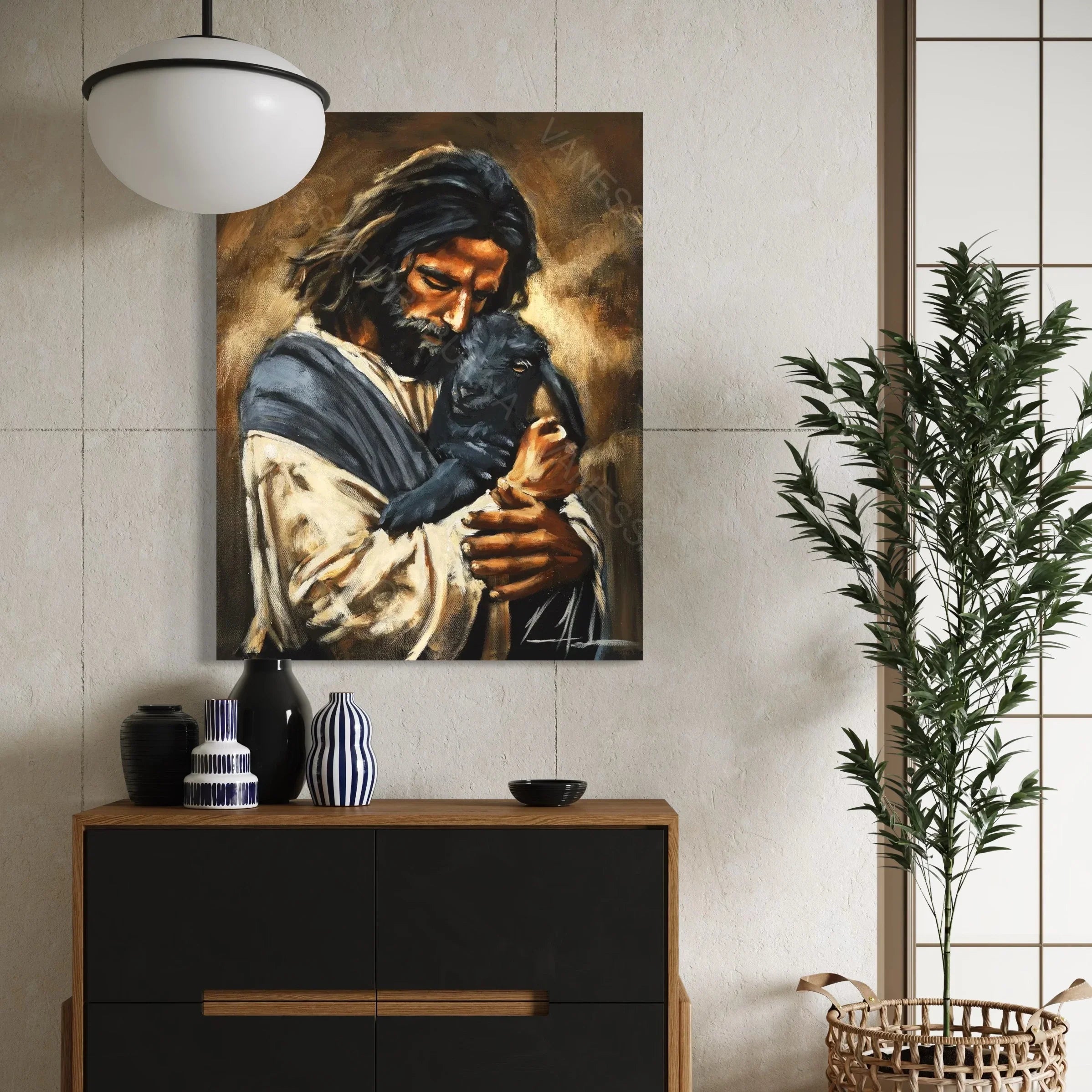 Wall-mounted art print of a man holding a black dog, warm brown and gold palette