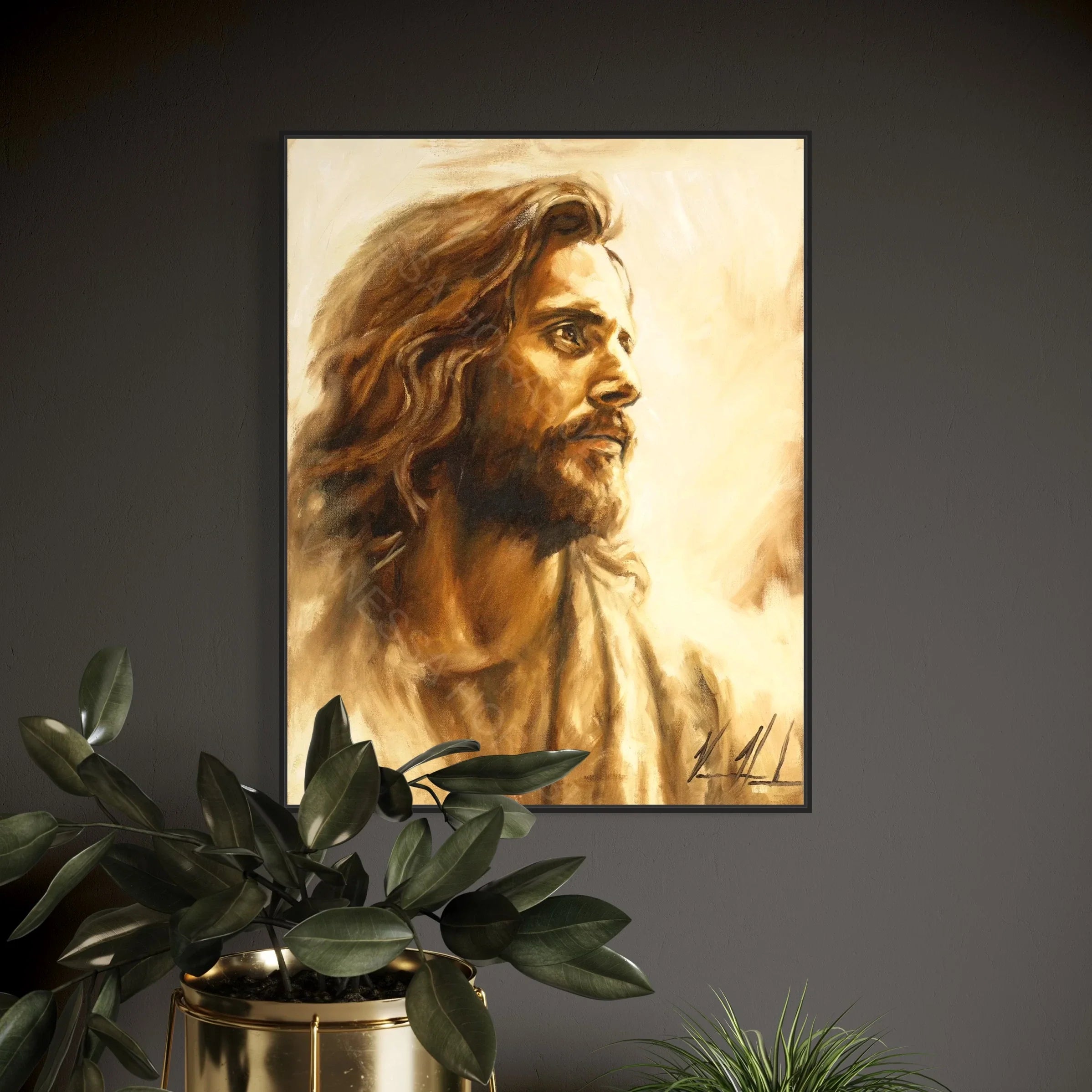 Framed portrait print of a long-haired bearded man in profile, warm golden light