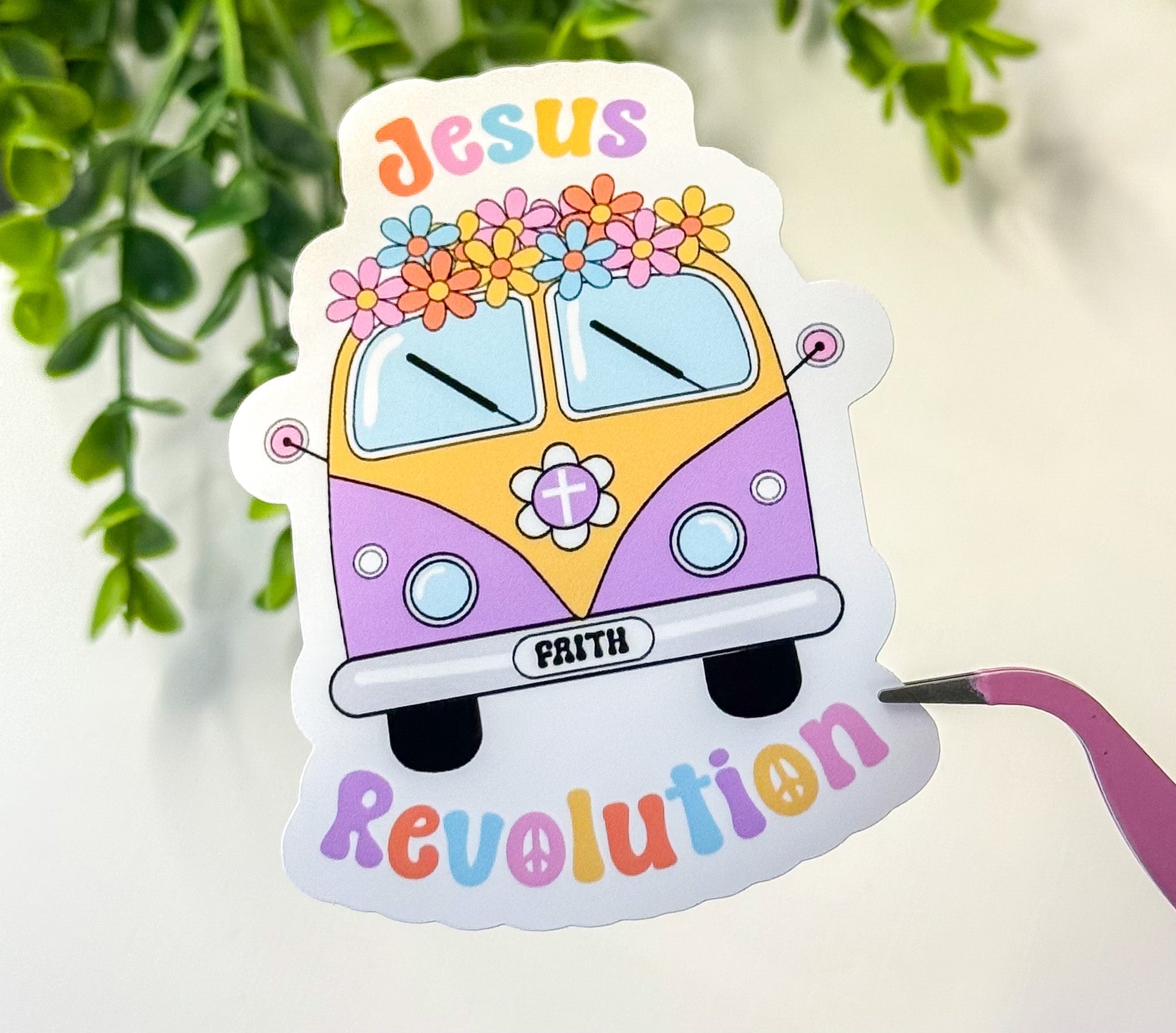Jesus Revolution sticker with cartoon yellow bus and flower crown, purple text