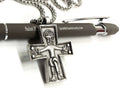 Silver cross pendant necklace with Jesus figure, shown on chain links