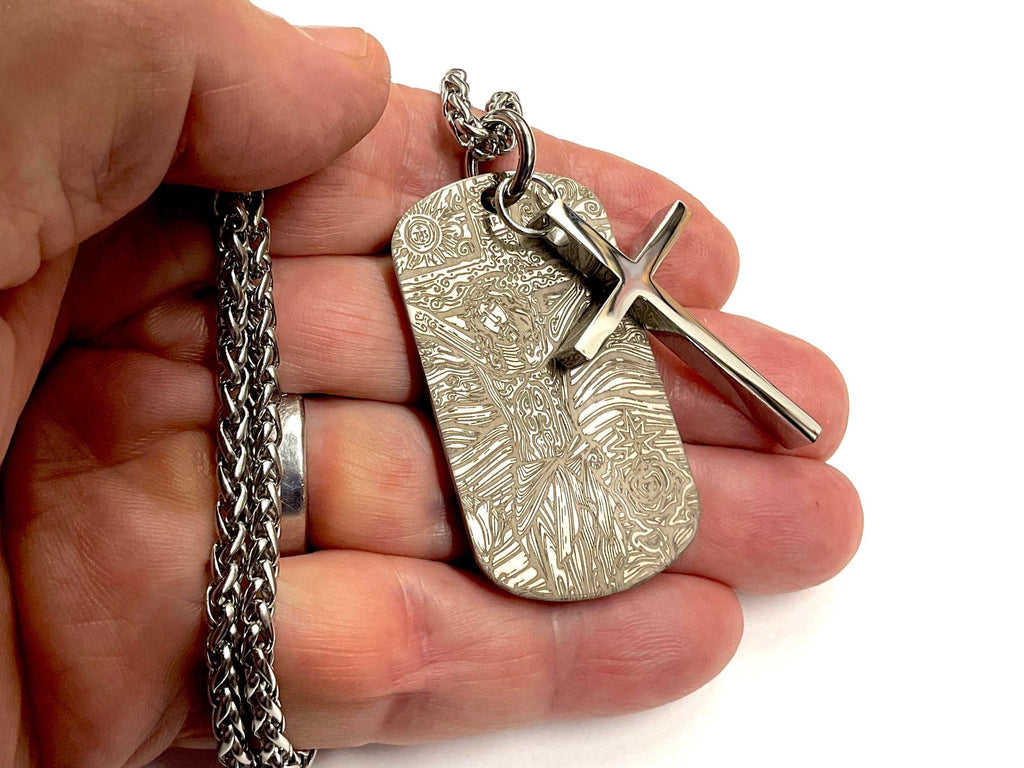 Engraved dog tag pendant with cross overlay and heavy keel chain, silver-toned