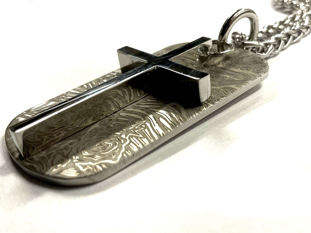 Engraved dog tag pendant with cross overlay and chain, silver-toned