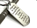 Silver dog tag keychain with Serenity Prayer lettering and split key ring, close-up