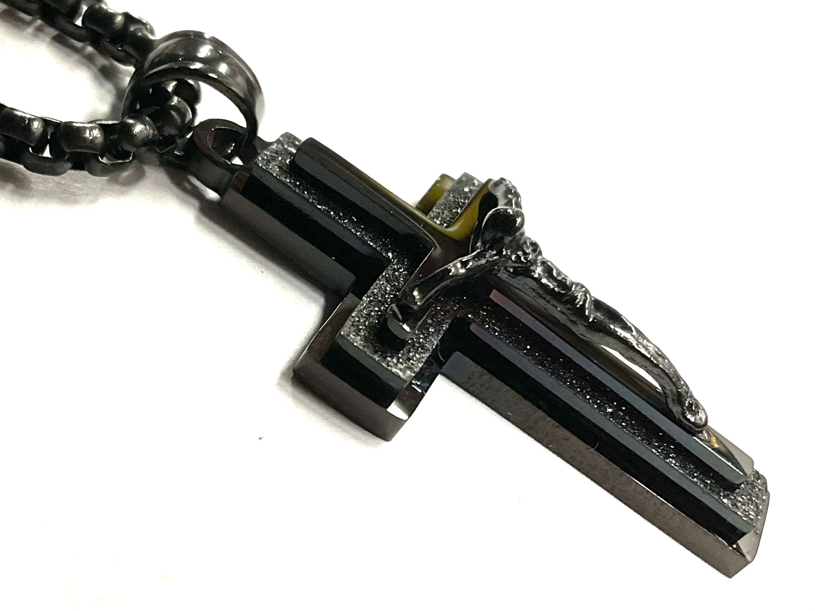 Black crucifix cross pendant necklace with silver accents and box chain