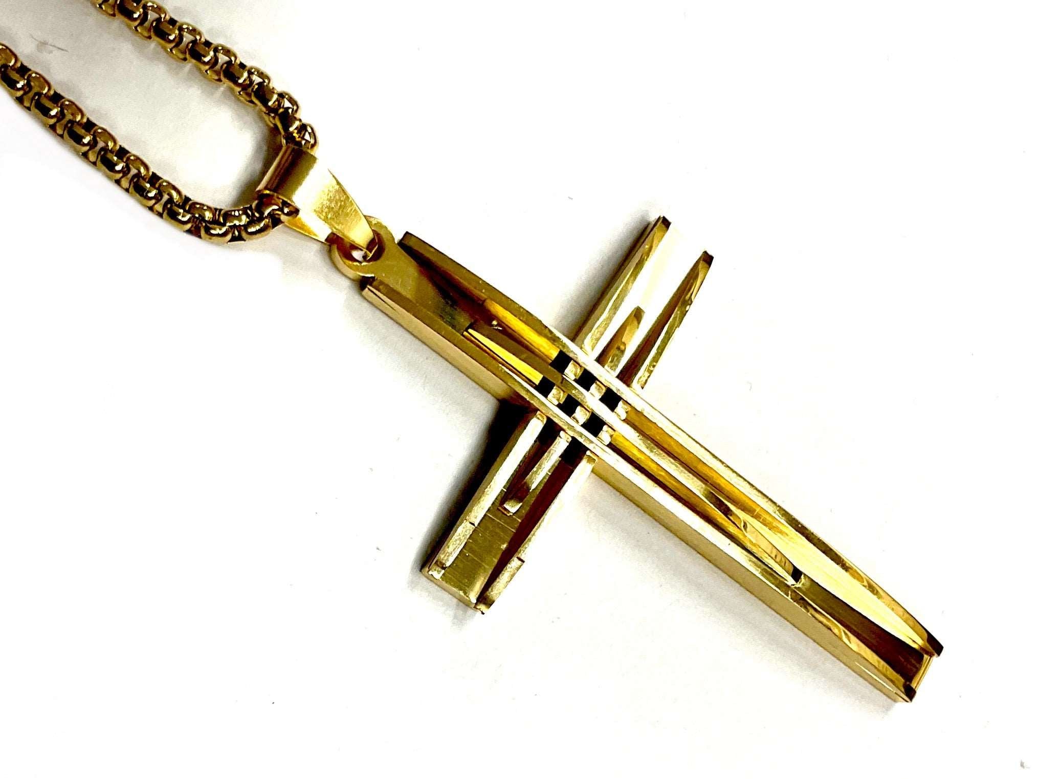 Gold-tone crucifix necklace with large cross pendant and stacked bar design