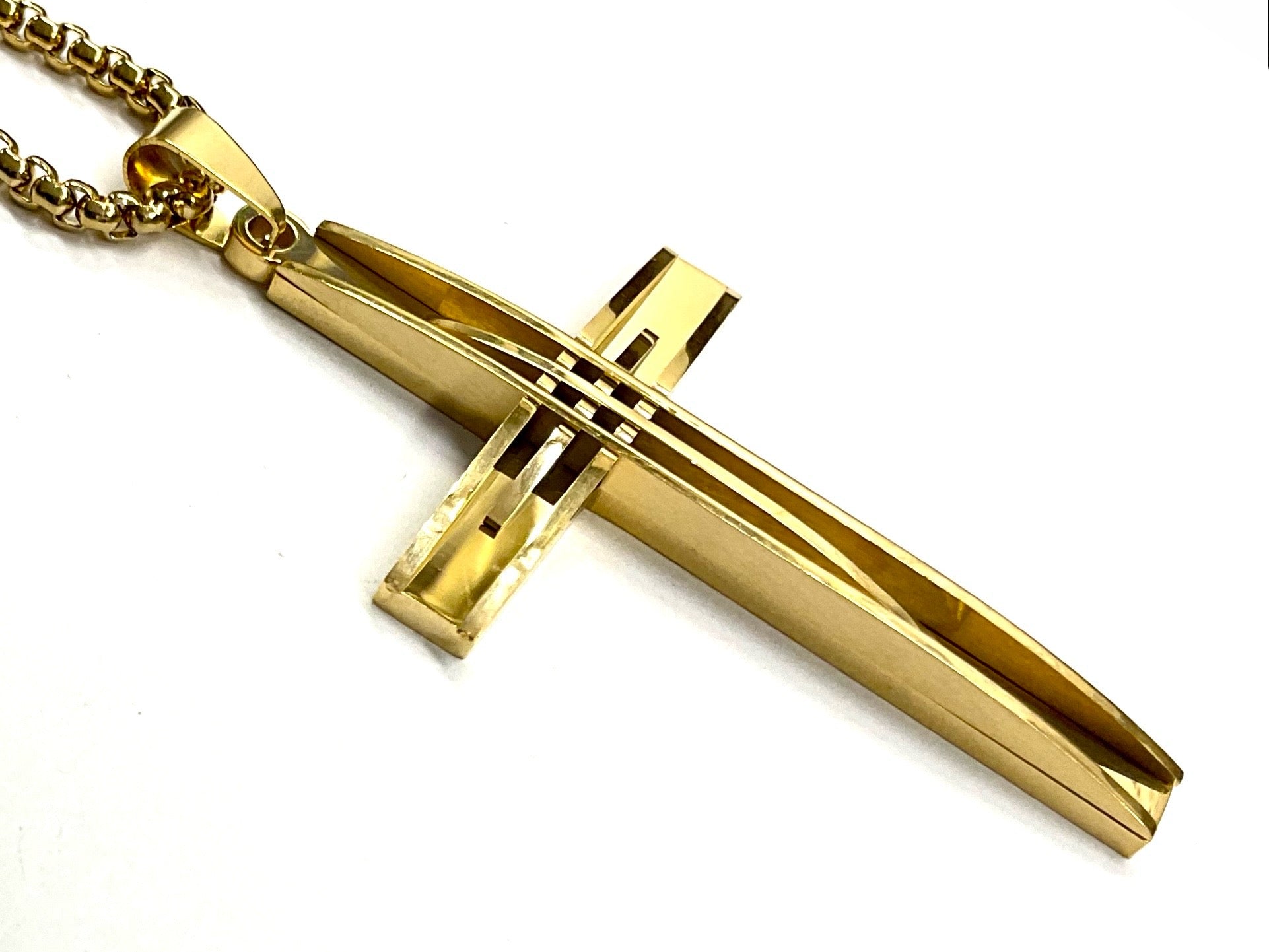 Gold-tone crucifix necklace with Cuban chain and cross pendant