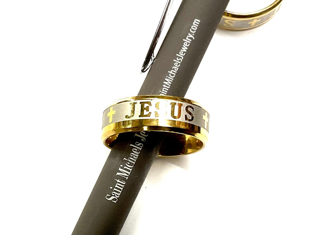 Gold wide stainless steel ring with cross and 'JE US' engraving on band