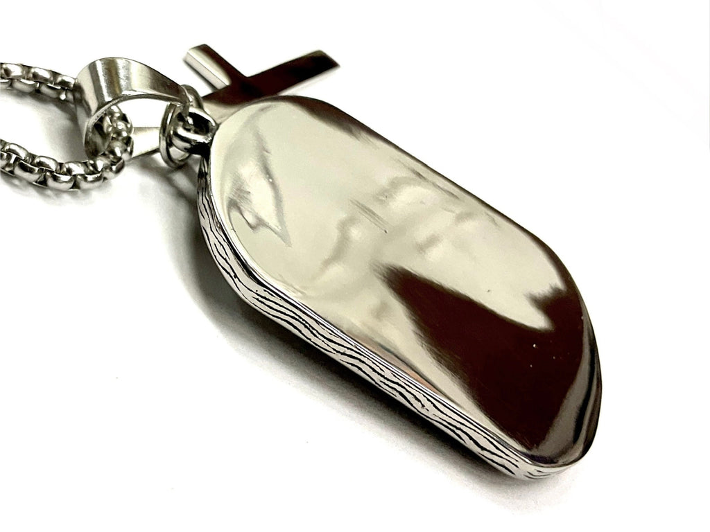 Silver-tone dog tag pendant on chain, eagle and cross engraving