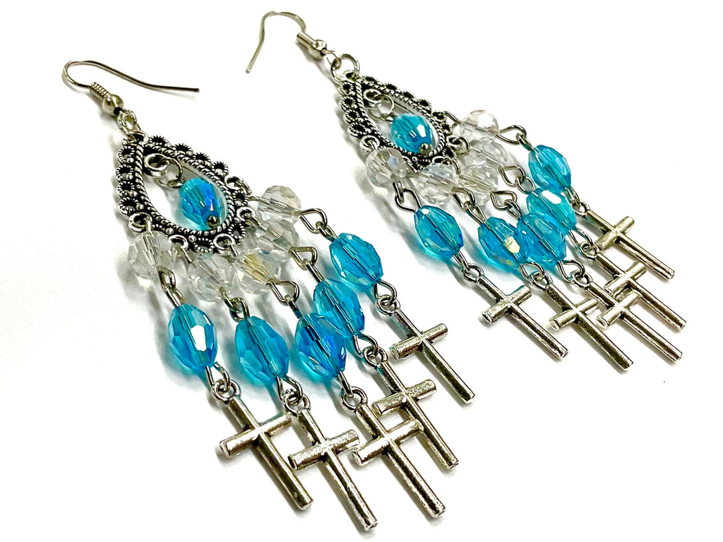Silver cross dangle earrings with blue glass beads and chain tassels