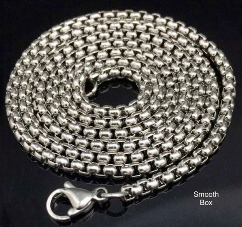Silver chain link dog tag necklace with lobster clasp detail, smooth box links.
