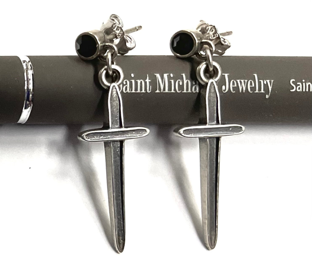 Sterling silver earrings with black onyx studs and long dagger dangle pendants