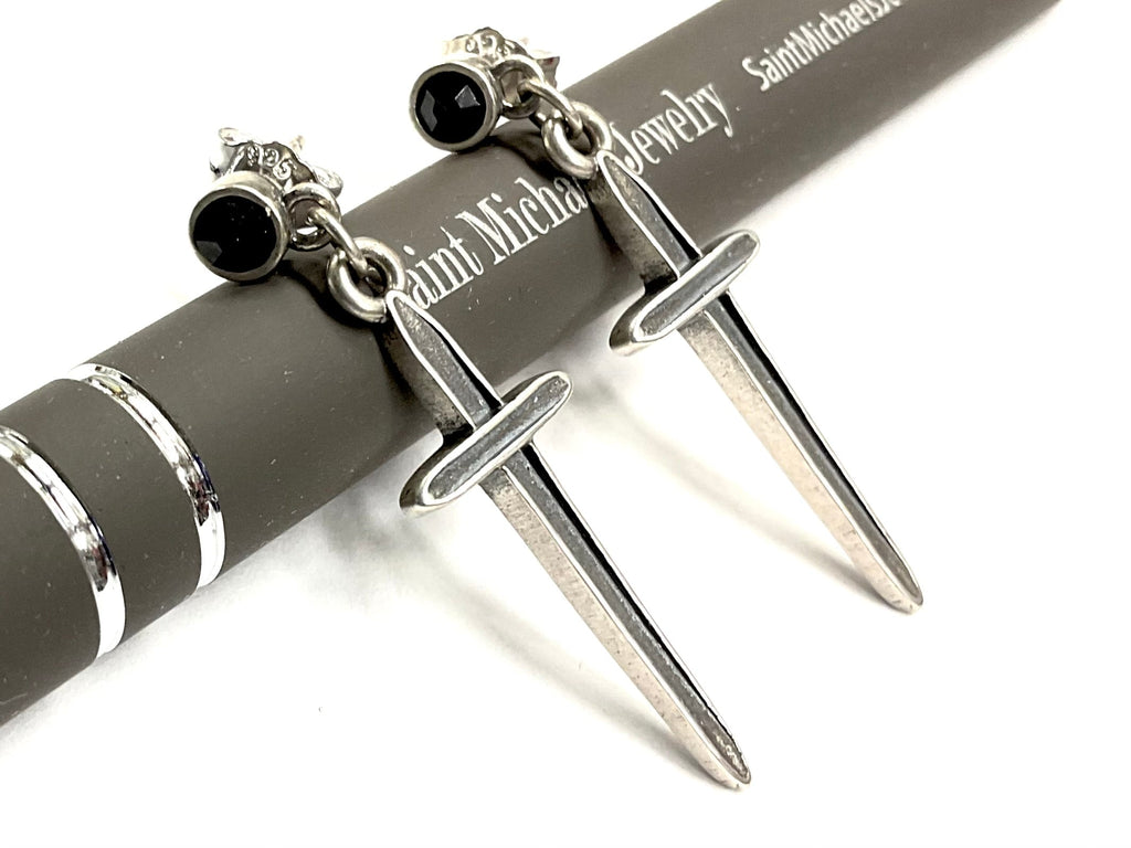 Sterling silver dangle earrings with black onyx round tops and dagger pendant drops