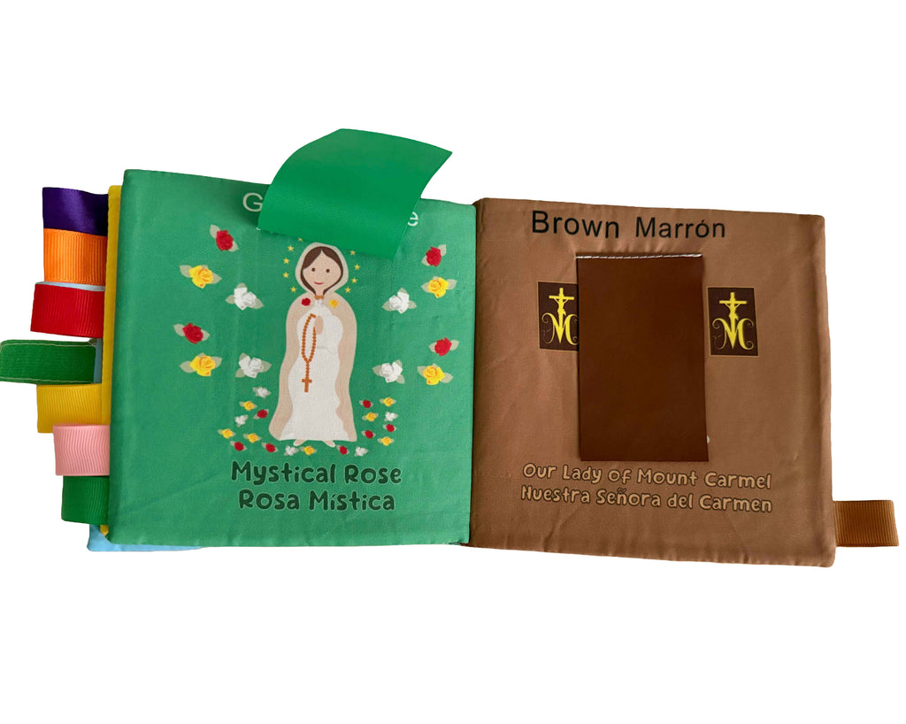 Closed fabric Mary colors book with green floral cover and brown page panel.