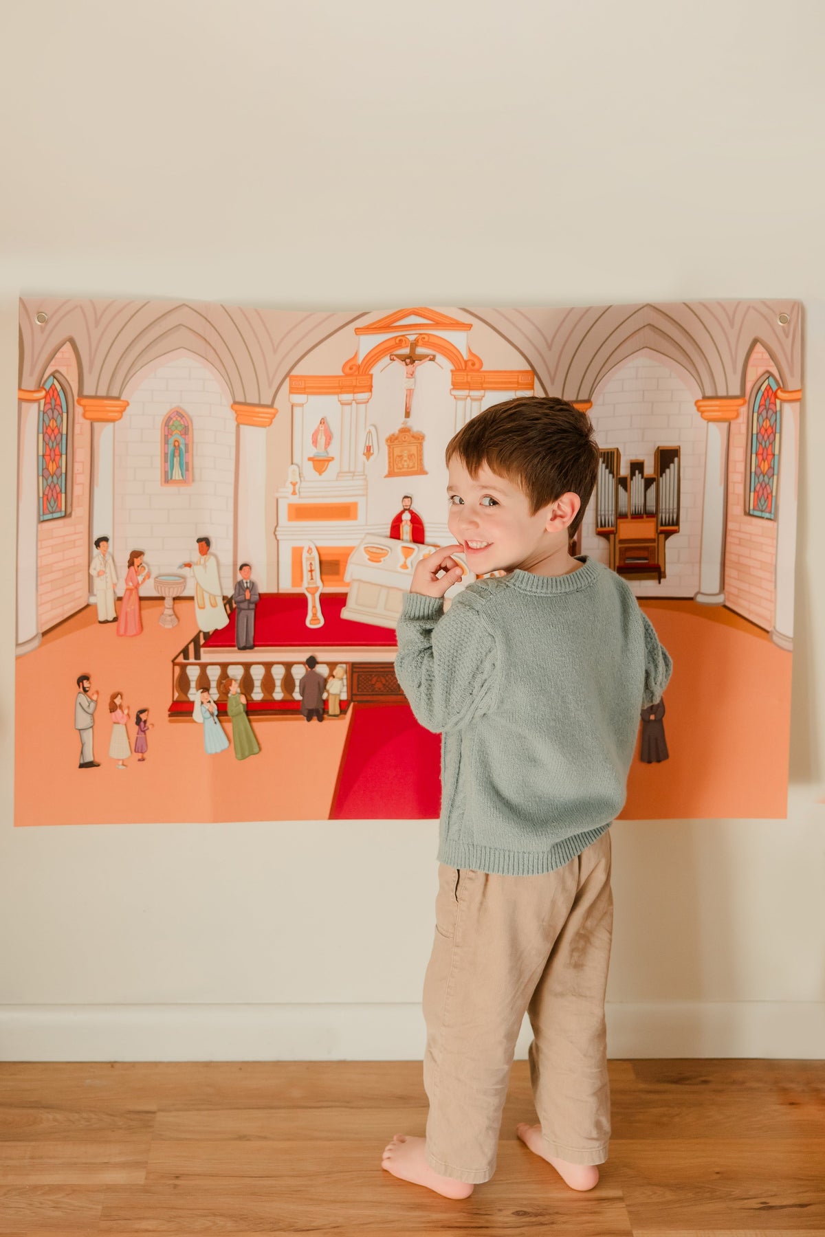 Children's church play story board with miniature figures and altar scene