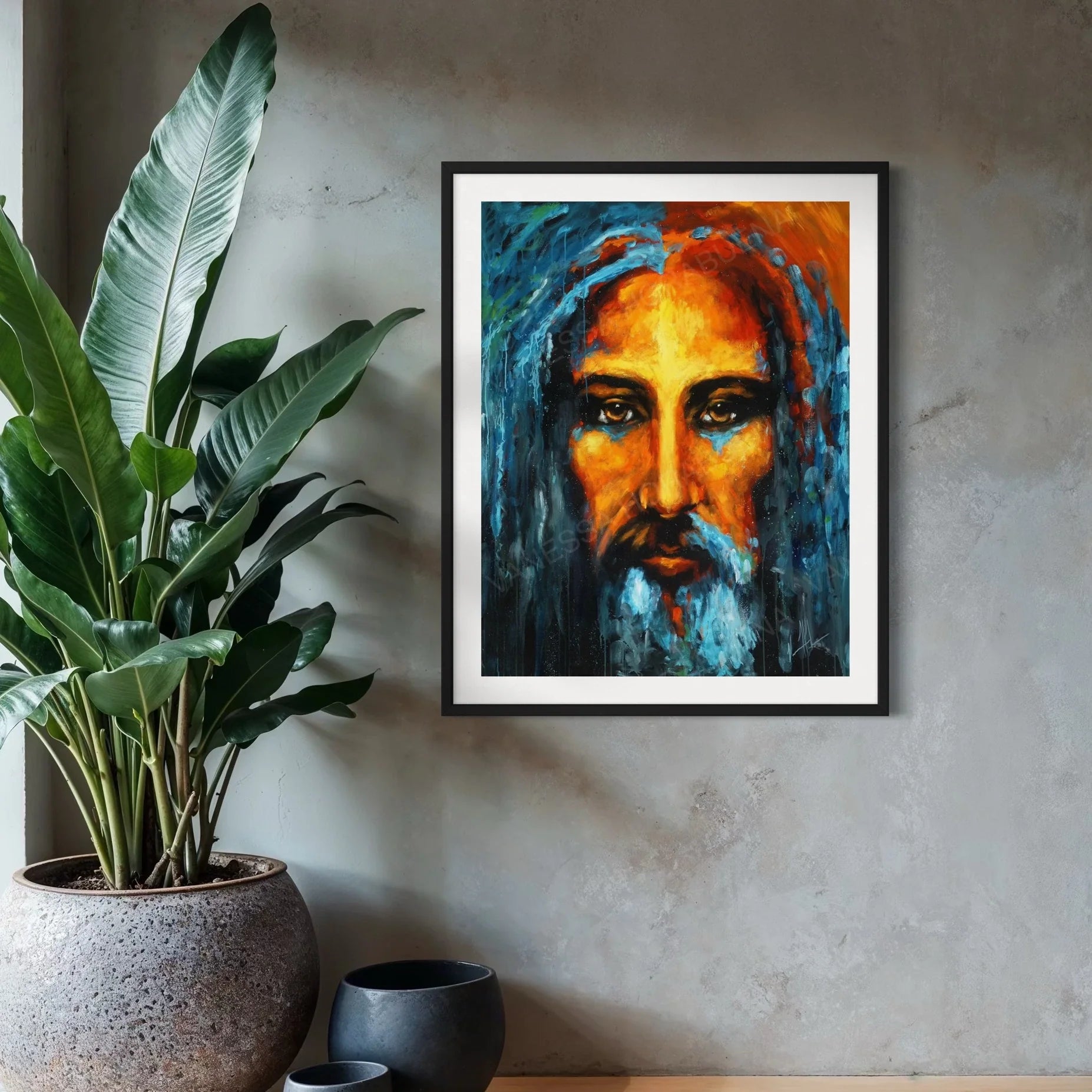 Framed portrait art print featuring a blue-toned face with orange accents