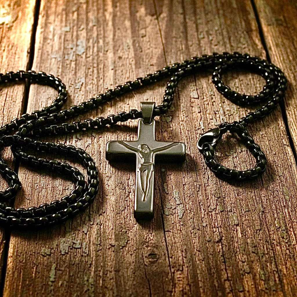 Cross pendant necklace with black beaded chains and silver-tone cross