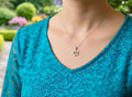 Silver Star of David necklace pendant with gold inlay cross at center