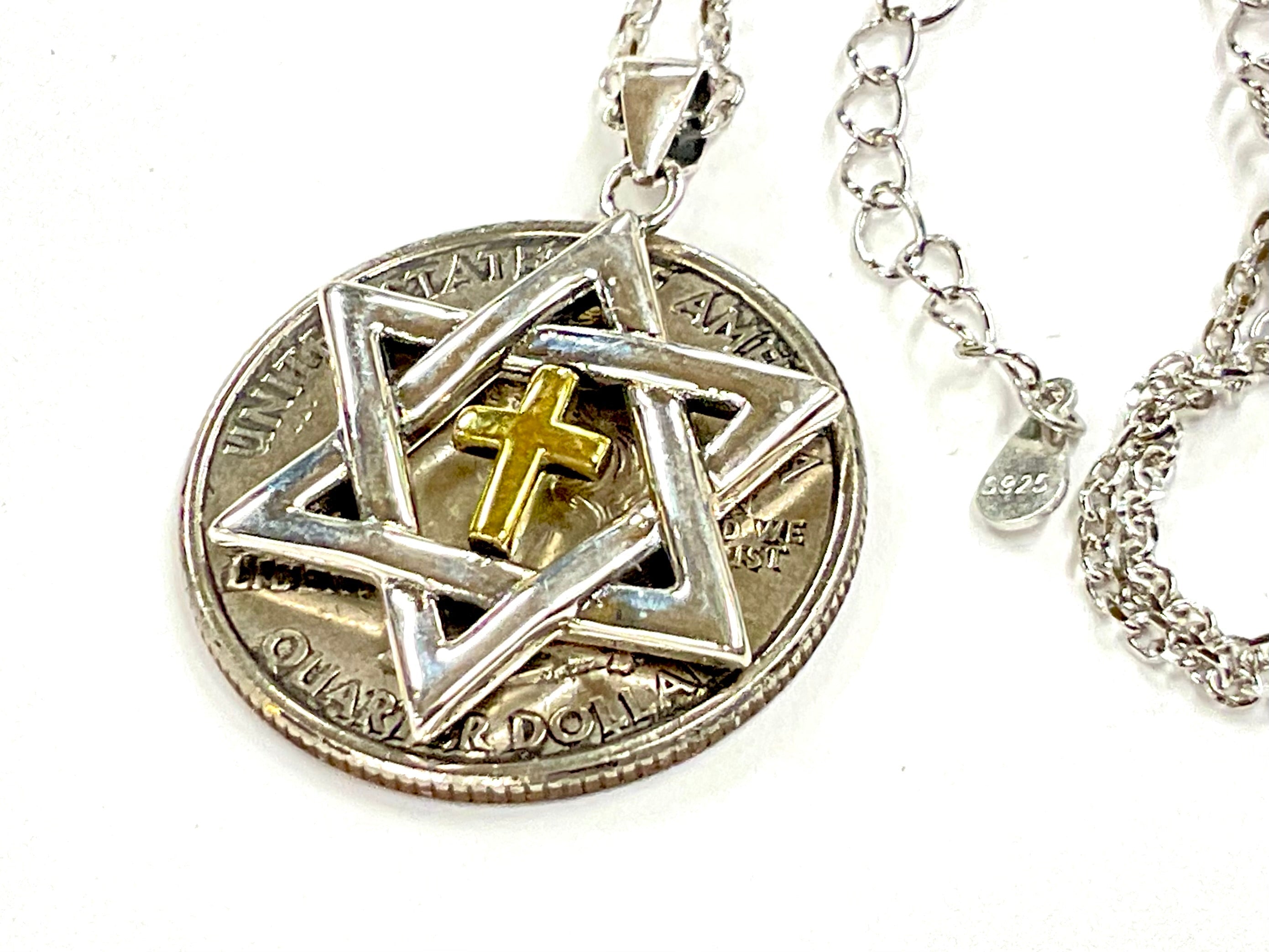 Round silver pendant necklace with Star of David design and gold inlay cross