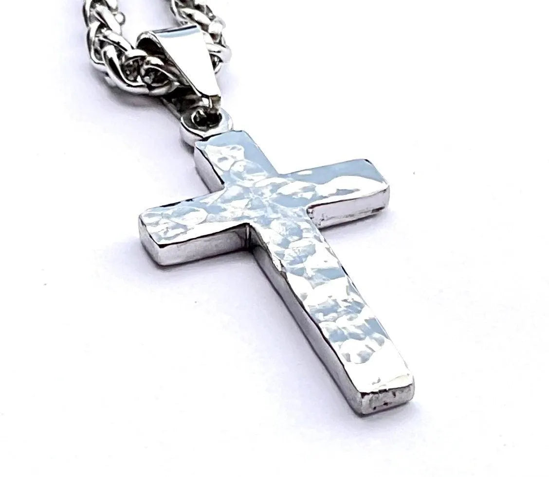 Silver cross pendant necklace with textured cross detail and chain