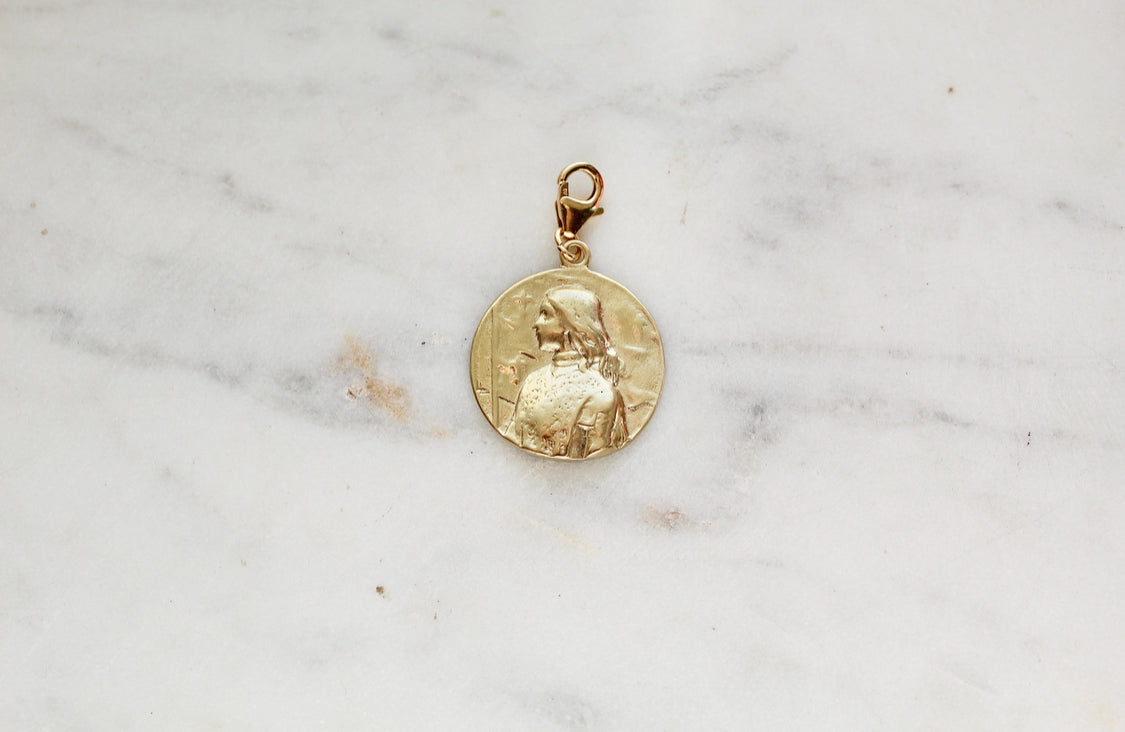 Gold St. Joan of Arc medallion pendant, round relief with small top loop bail