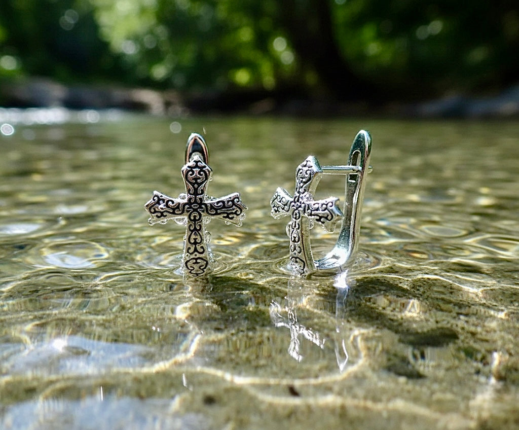 Sterling silver cross cuff earrings with ornate cross, lever back, reflective shine