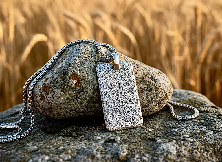 Sterling silver dog tag pendant with ornate engraved Jesus cross, linked chain