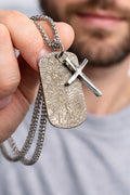 Engraved dog tag pendant with cross overlay and heavy keel chain, silver-toned