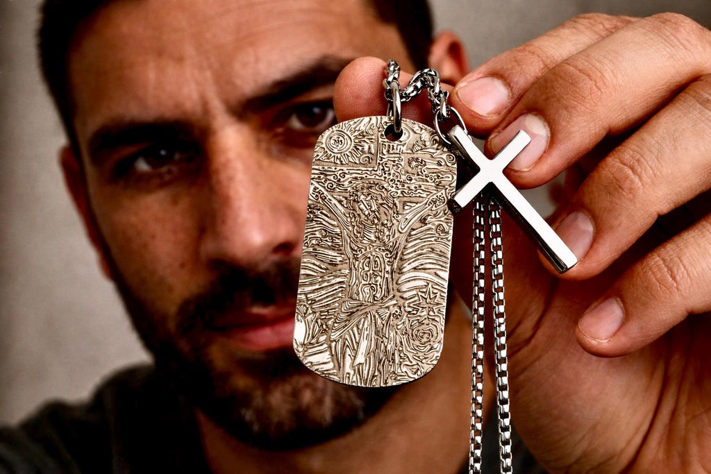 Engraved dog tag pendant with cross overlay, held with heavy chain, silver-toned