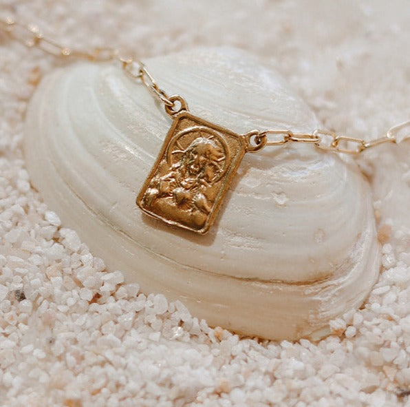 Gold paperclip scapular necklace with square portrait pendant on chain