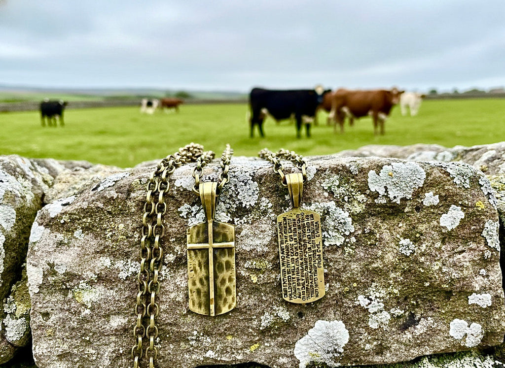 Gold-toned dog tag pendant necklace with cross and engraved scripture tags on chain