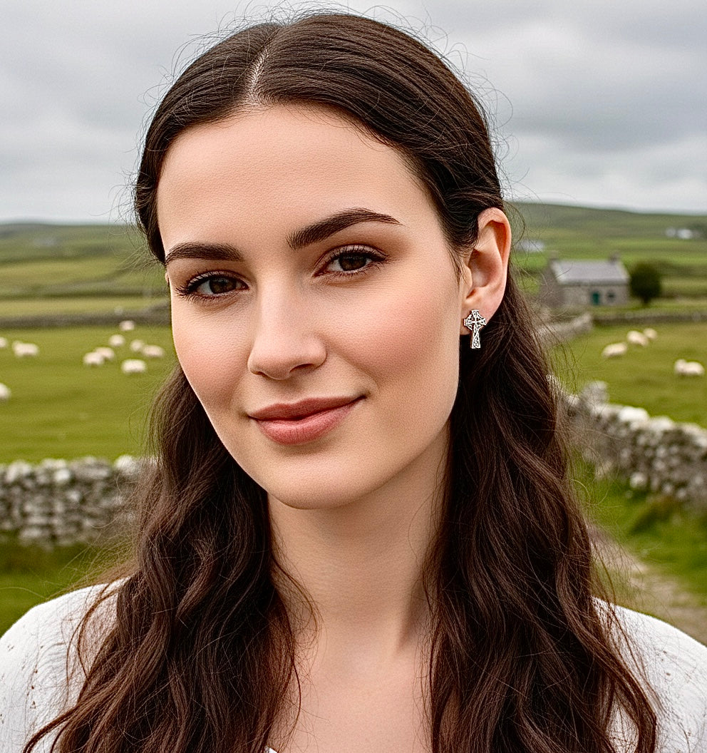 Celtic knot cross stud earrings with silver-tone detailing and small post backs