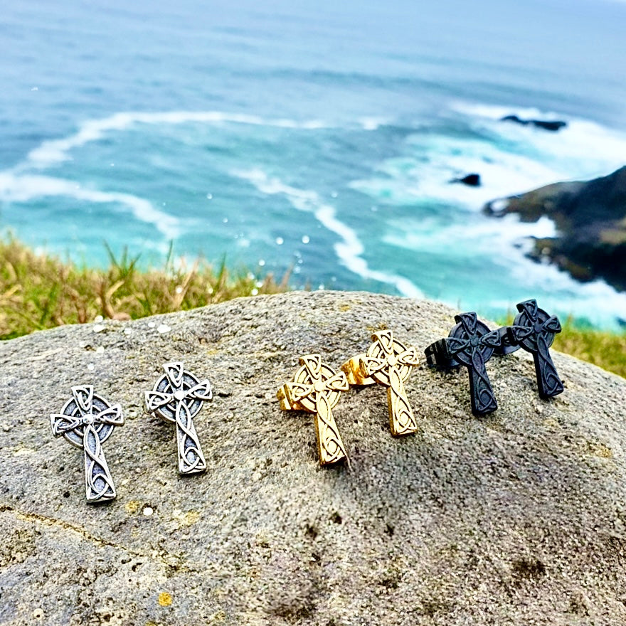 Celtic knot cross stud earrings trio in silver, gold, and black finishes