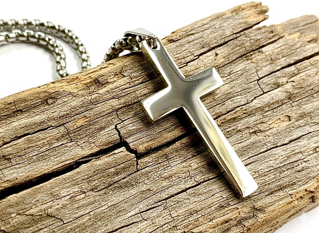 Stainless steel cross pendant on a silver link chain