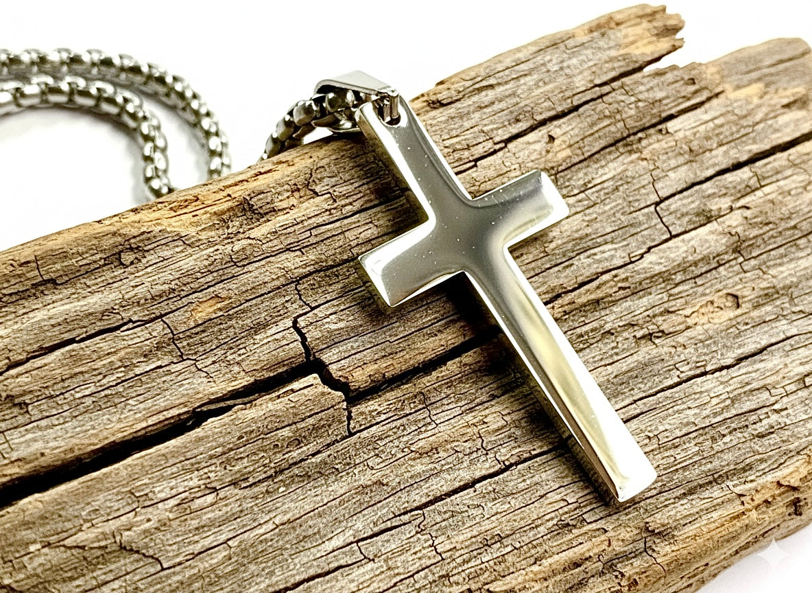 Stainless steel cross pendant on a silver link chain