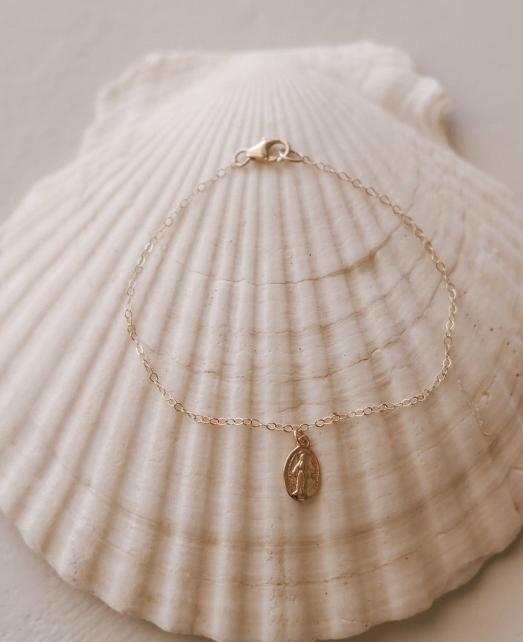 14K gold dainty bracelet with oval miraculous medal charm, fine link chain