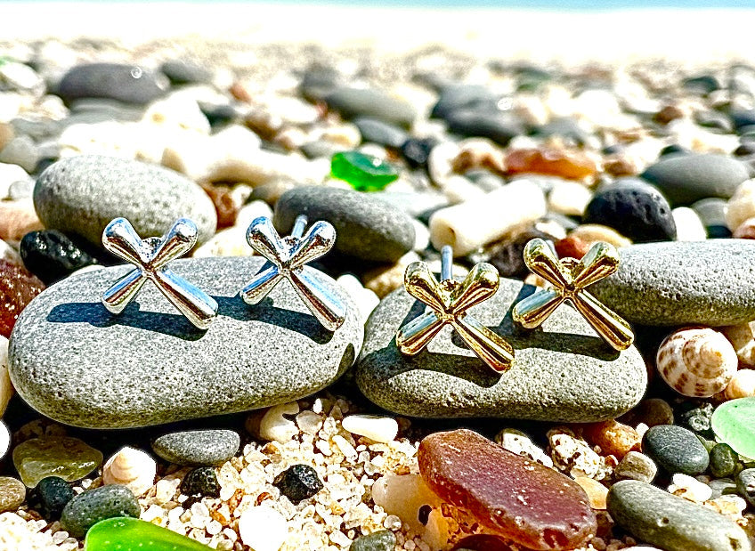 Gold-tone cross stud earrings with a modern flowing curved design