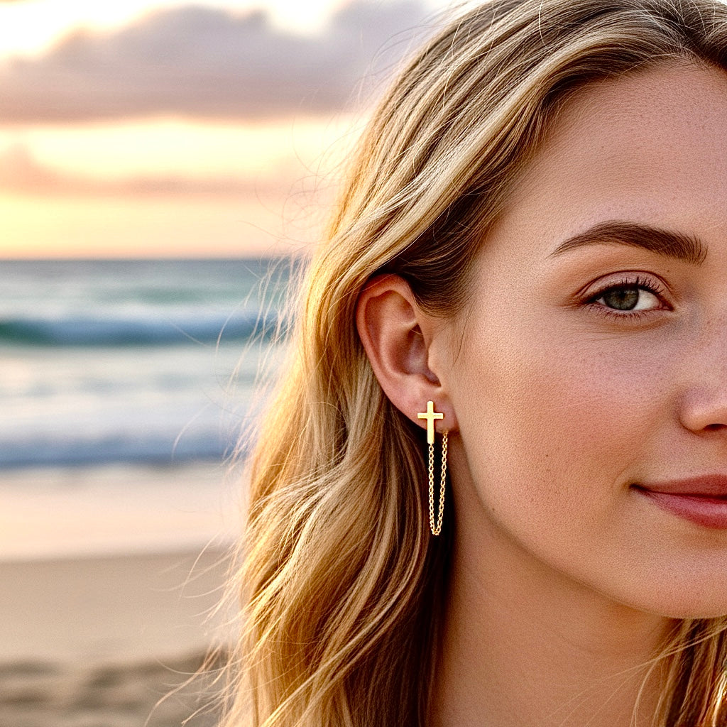 Gold cross tassel chain earrings with small drop hoops